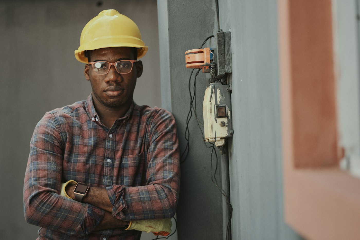 Electrician inspecting a residential electrical panel