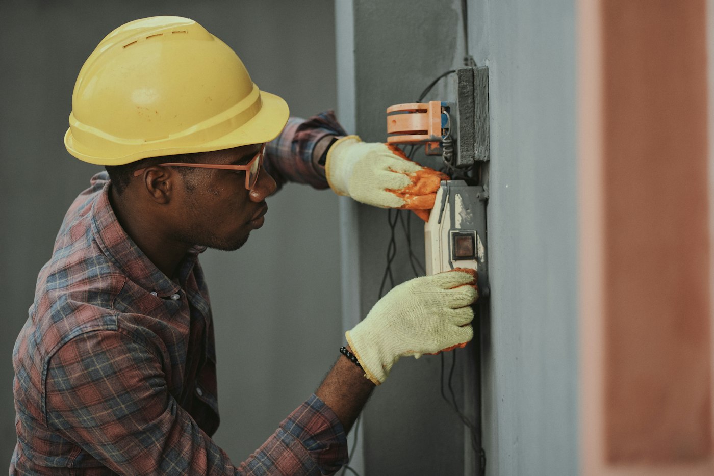Heating and cooling technician servicing an outdoor unit