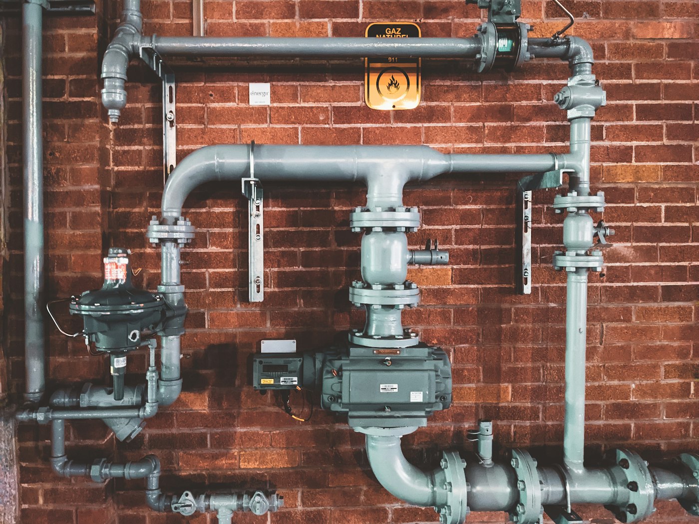 Licensed plumber working on home water lines